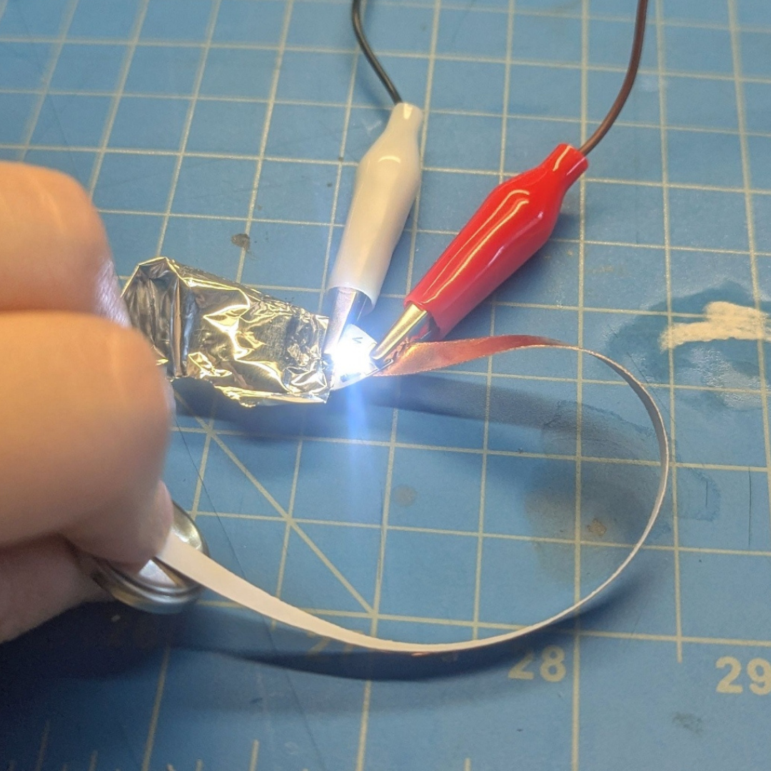 Then I experimented with mixed materials again this time, using copper tape and aluminum foil. As the light flashed up, I came up with more artistic experiments, and that was...